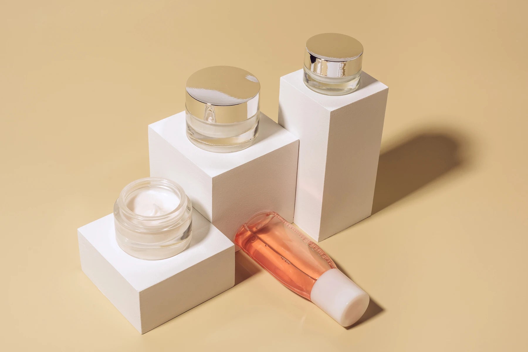 Custom compounded skincare products including creams and serums