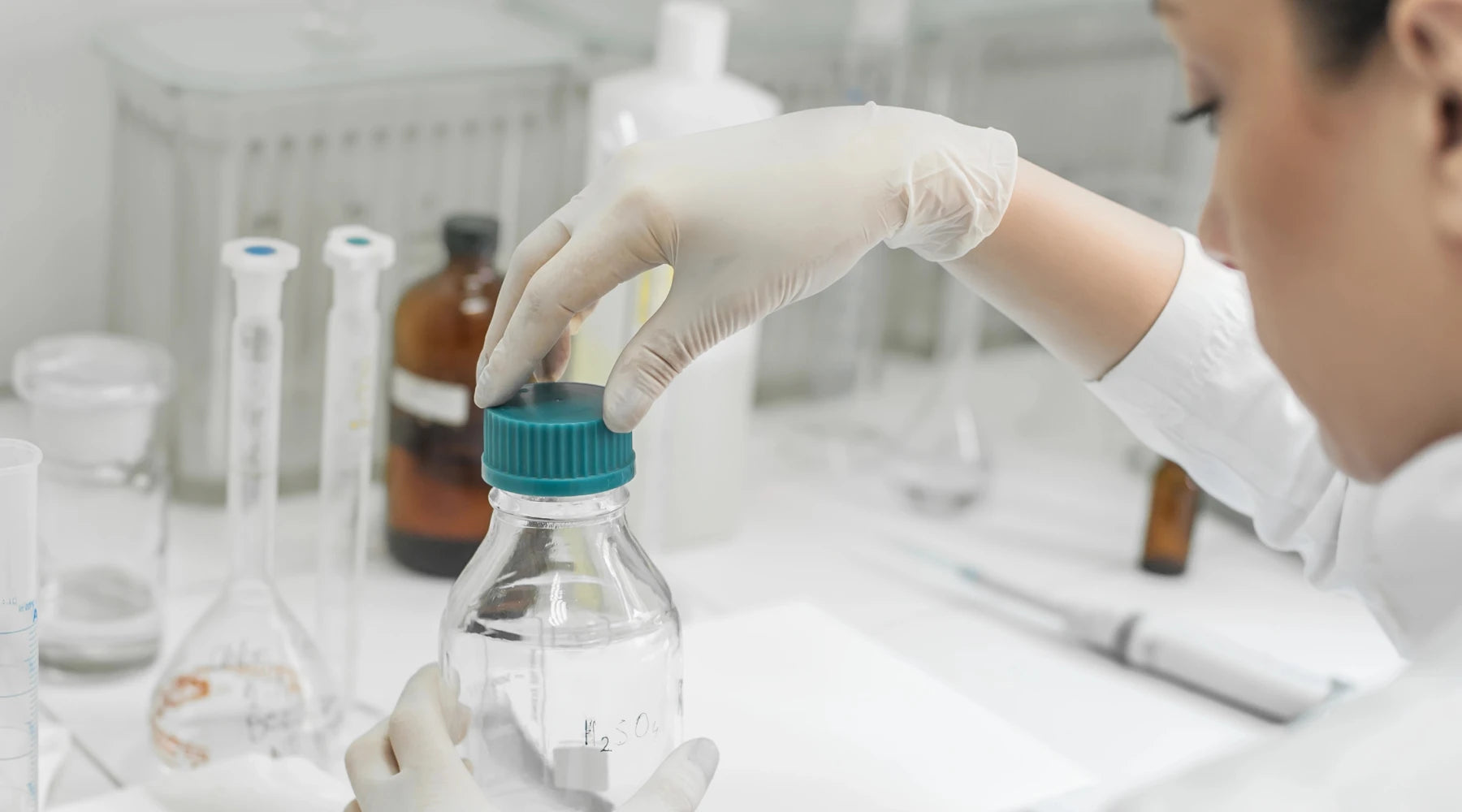 Pharmacist preparing medication in a clean laboratory environment