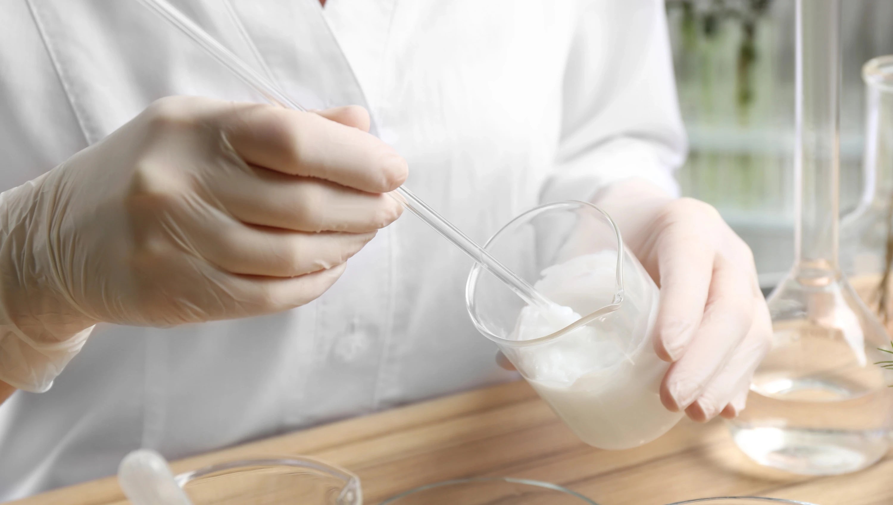 Pharmacist preparing specialised compounded medications in a laboratory